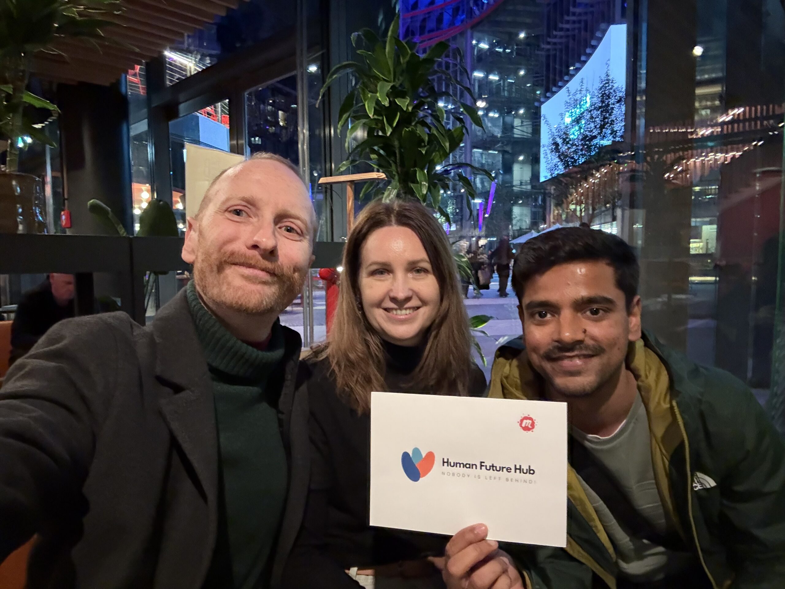 Human Future Hub Team smiling and inviting to join their meetups