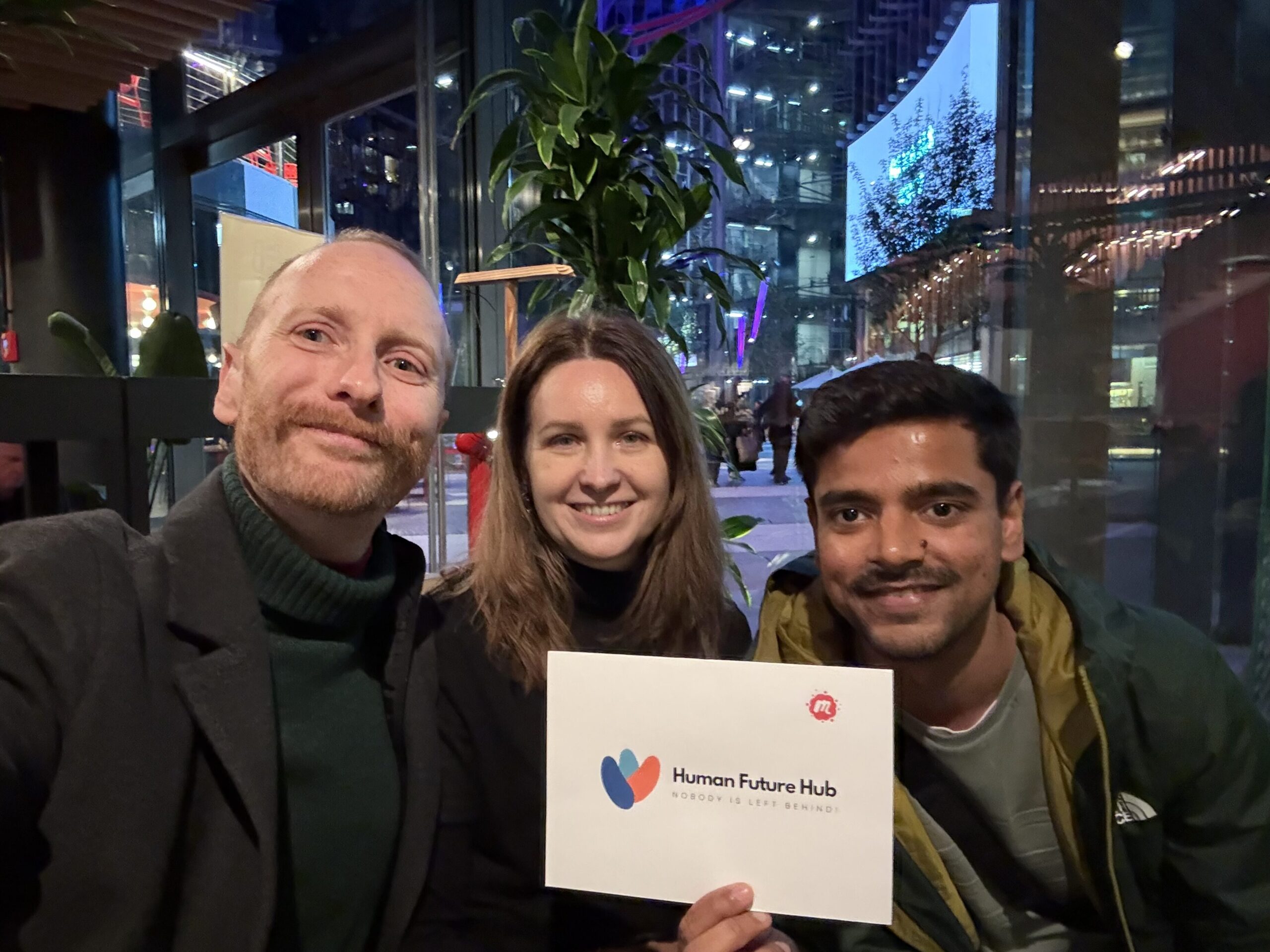Human Future Hub Team smiling and inviting to join their meetups